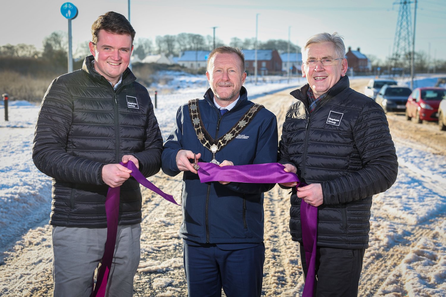 Mayor of Antrim and Newtownabbey Stephen
                          Ross with two Neptune Group representatives