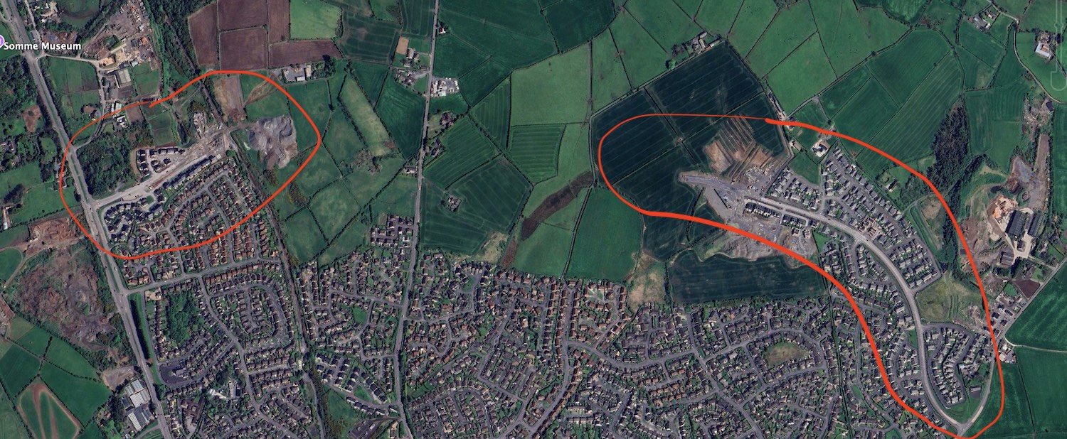 Aerial
                          view of Newtownards. A short length of new
                          road is visible on the left and a longer
                          stretch on the right. There are green fields
                          between them.