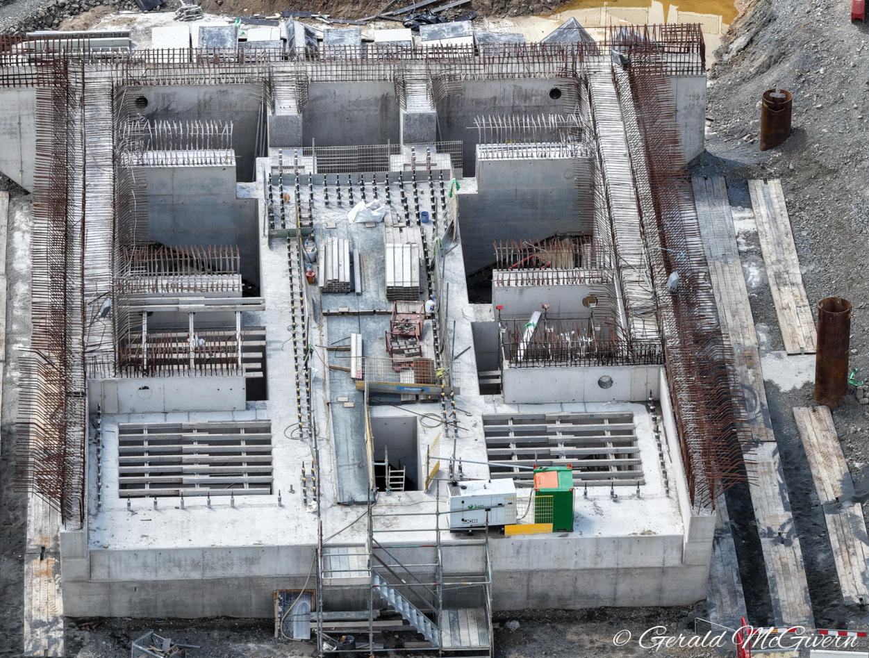 Looking down on a square concrete
                          structure subdivided into eight smaller
                          compartments