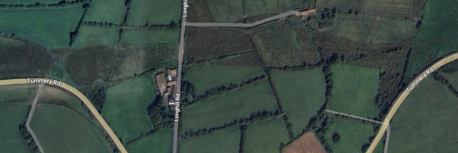 Aerial view of fields showing a series of
fields arranged left-right whether the fields
are growing shrubs instead of grass.